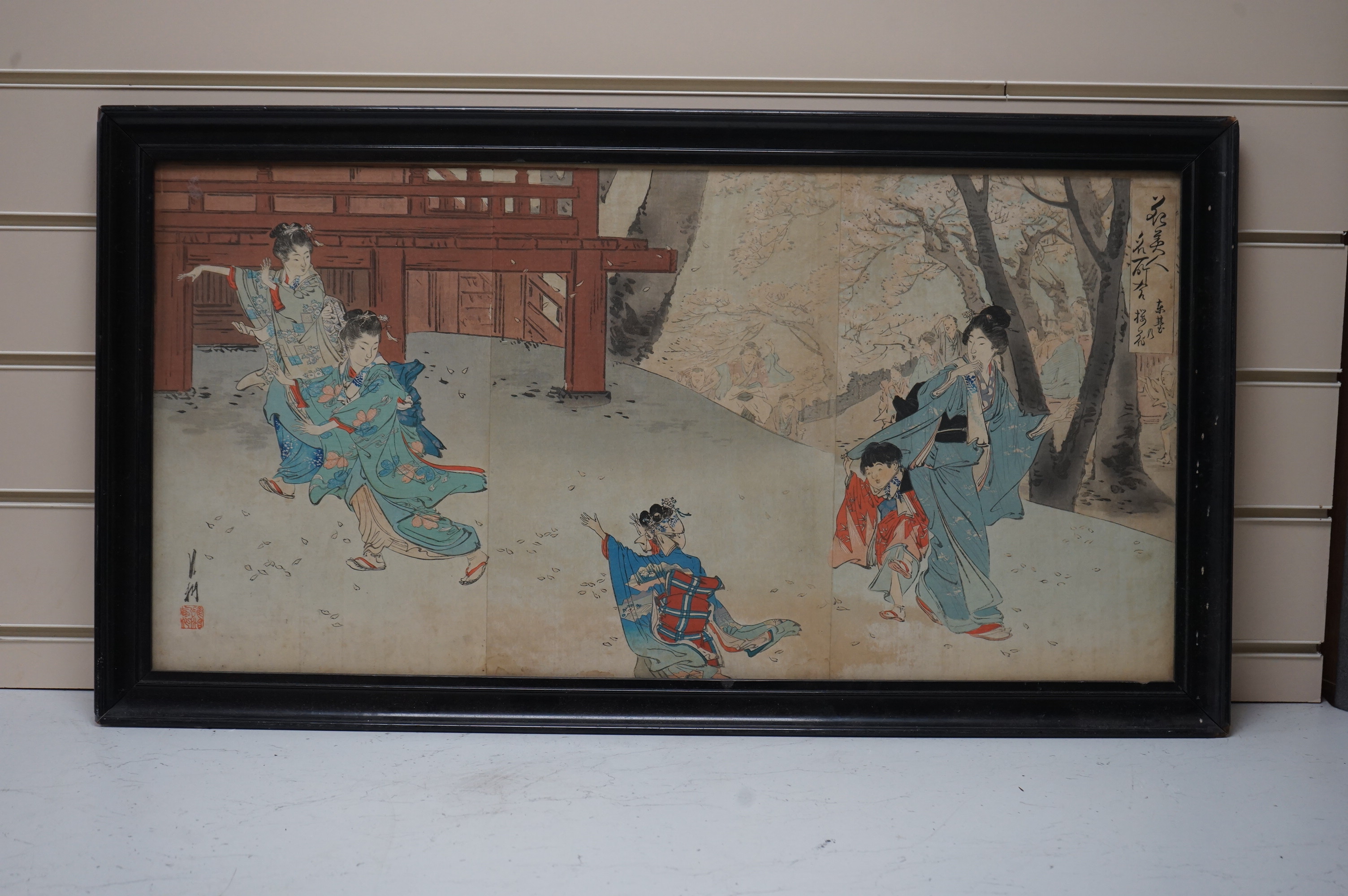 Japanese woodblock print, women wearing kimonos before a landscape, signed with character marks and red seal marks, 36 x 71cm. Condition - fair